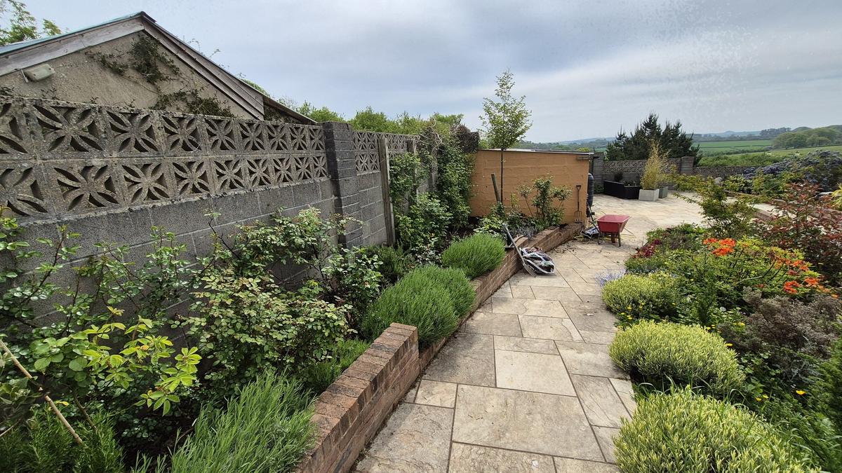 Landscaped patio completed by AJS Gardening